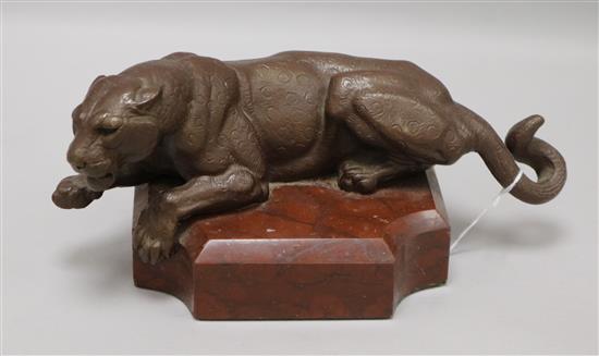 A bronze leopard on rouge marble base, length 28cm